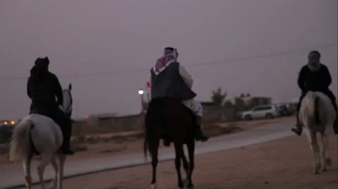 Arab Horsemen on desert during sunset. Bahrain 库存影片 59592459