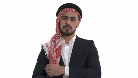 Young man wearing Keffiyeh on head, carrying bullhorn, you…