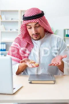 Arab man with bitcoin in cryptocurrency mining concept Stock Photos