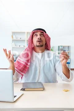 Arab man with bitcoin in cryptocurrency mining concept Stock Photos