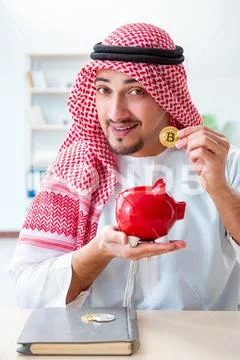 Arab man with bitcoin in cryptocurrency mining concept Stock Photos
