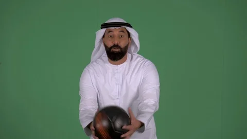 Arab man catching a ball. Video stock 94479834