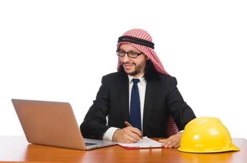 Arab man with computer and hardhat 스톡 사진