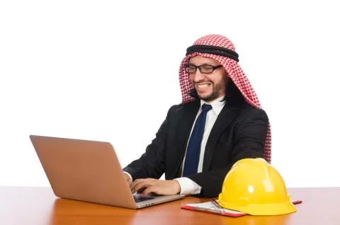 Arab man with computer and hardhat Stockfoto's