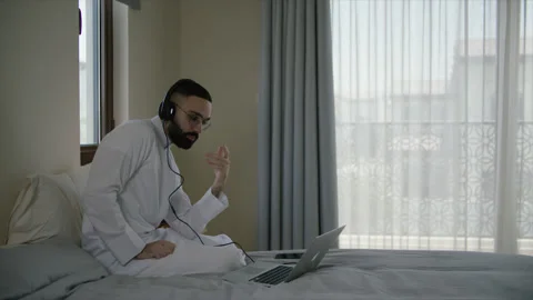 Arab man doing a video call from home. Stock Footage 135556752