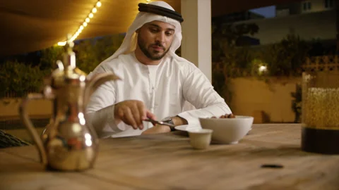 Arab man eating dates. Stock Footage 136112639