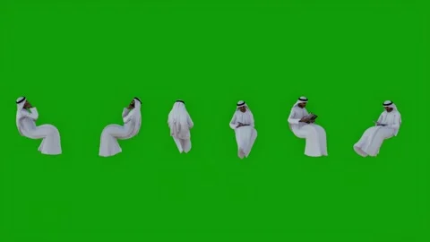 Arab man on green screen sitting reading a book and talking on the phone in six  스톡 동영상 204860482