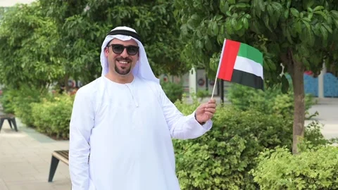 Arab Man holding UAE flag Video stock 142237169