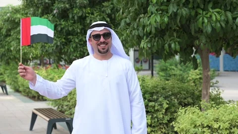 Arab Man holding UAE flag Video stock 142237187