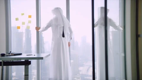 Arab man looking out the window. Stock Footage 129402561