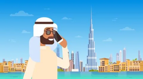 Arab Man Speaking On Cell Smart Phone Call Over Dubai Skyline Panorama, Modern Ilustración de archivo