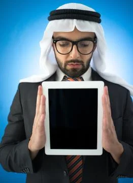 Arab man with tablet screen Foto stock