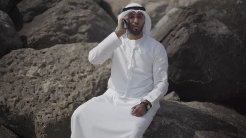 Arab man talking on his mobile. Stock Footage 105780836