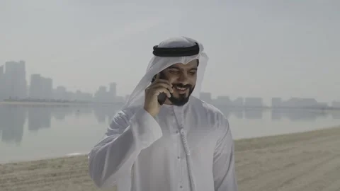 Arab man talking on his mobile. Video stock 302535584