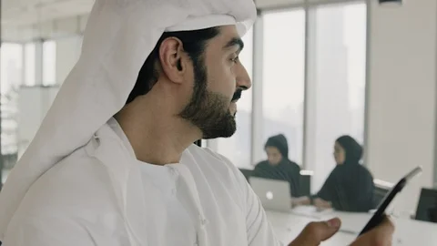 Arab man texting on his mobile. Stock Footage 126310646
