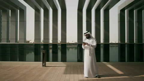 Arab man texting on his mobile. Stock Footage 151827083