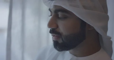 Arab man texting on his mobile. Stock Footage 247115860