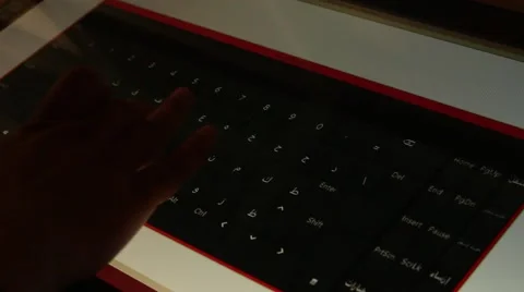 Arab man is typing in Arabic virtual touchscreen electronic keyboard Stock Footage 49642820
