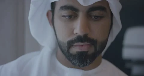 Arab man typing on his iPad. Video stock 247087771