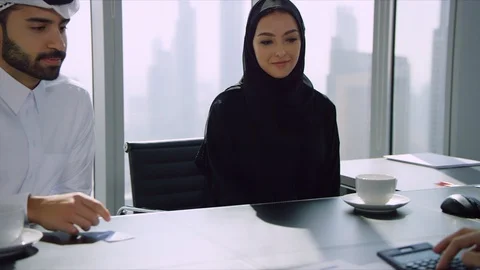 Arab man using a calculator. Stock Footage 129391701