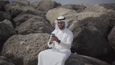Arab man using his mobile. Stock Footage 105780727