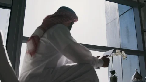 Arab man using a tablet. Stock Footage 125915441