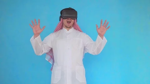 Arab man in virtual reality glasses Stock Footage 107305606