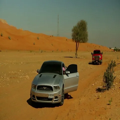 Arab man walking out of the car on desert. Stock-Footage 69496236