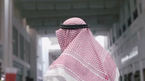 Arab Man walks through the local Souk. Stock Footage 157396489