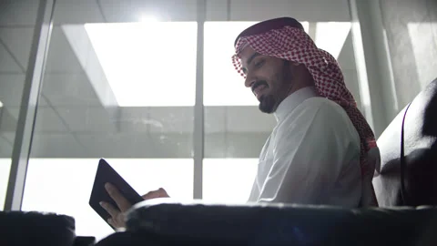 Arab man working on his tablet. Stock Footage 151481492