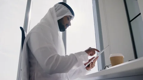 Arab man working on a tablet. Stock Footage 126310261