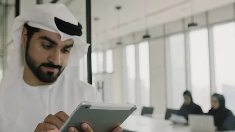Arab man working on a tablet. Stock Footage 126310669