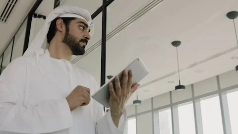 Arab man working on a tablet. Stock Footage 126310675