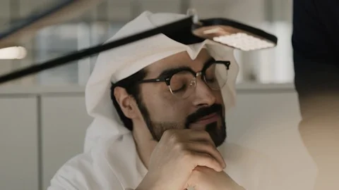 Arab men discussing in an office. Stock Footage 126310714