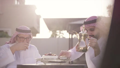 Arab men drinking gawa together. Video stock 135701639