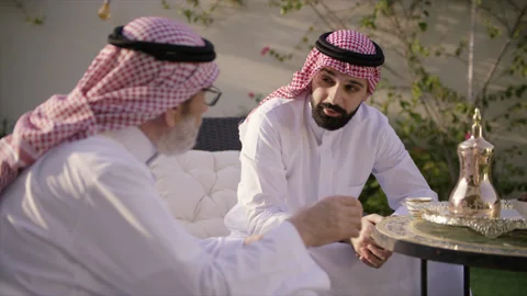 Arab men drinking gawa together. Stock Footage 135707645