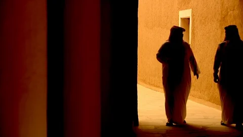 Arab men walking through a lane. Stock Footage 120055557