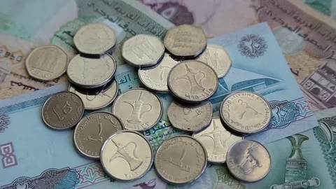 Arab money UAE dirhams on rotating surface background 스톡 동영상 70047491