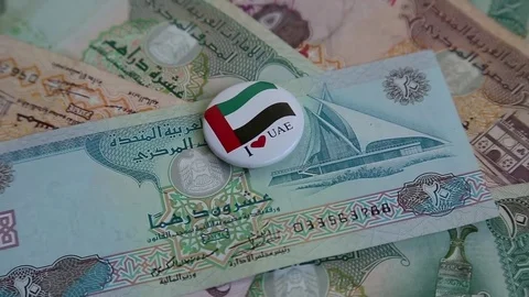 Arab money UAE dirhams on rotating surface background Video stock 70047556
