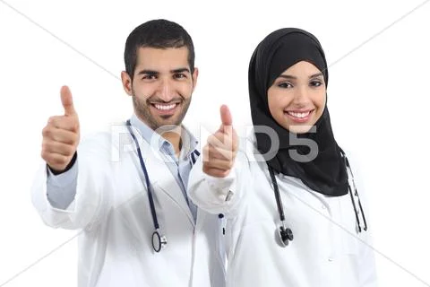 Arab saudi emirates doctors happy with thums up Stock Photos