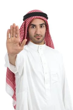 Arab saudi man gesturing stop with his hand Stock Photos