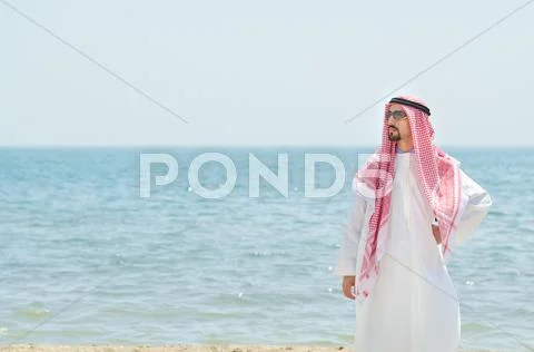 Arab On Seaside In Traditional Clothing