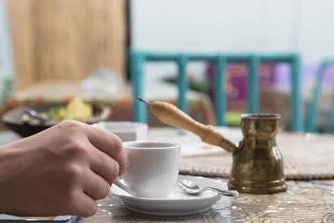 Arab small copper coffee pot with cup Stock Photos