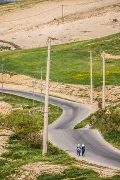 Arab students going to school by the road Stock-Fotos