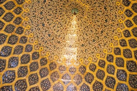 Arabesque patterns of the dome in the Sheikh Lotfollah Mosque. Isfahan, Iran. Stock Photos