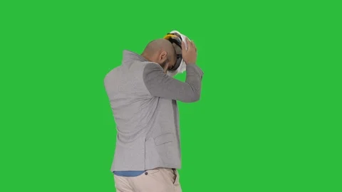 Arabian engineer with hardhat walking Safety concept on a Green Screen, Chroma Stock Footage 113017783
