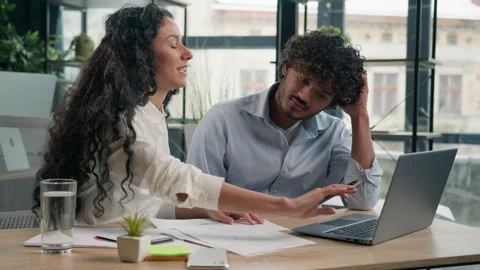 Arabian mentor help silly intern Indian coach advise trainee explain computer Stock Footage 249655272