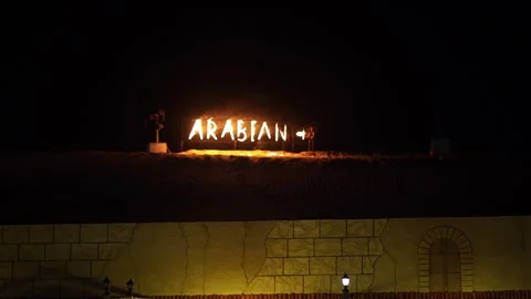 Arabian Nights themed fire show performance on stage in Dubai Stock Footage 343489048