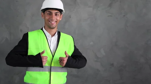 Arabic builder manager. Male Engineer showing fingers up and smile. Construction Video stock 198171816