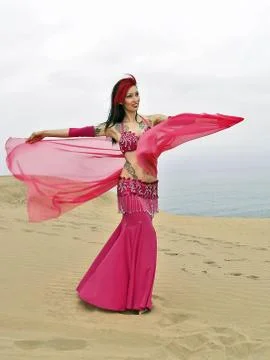 Arabic dance at dunes Stock Photos